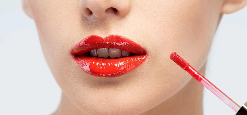 How can I prevent gloss from bleeding?
